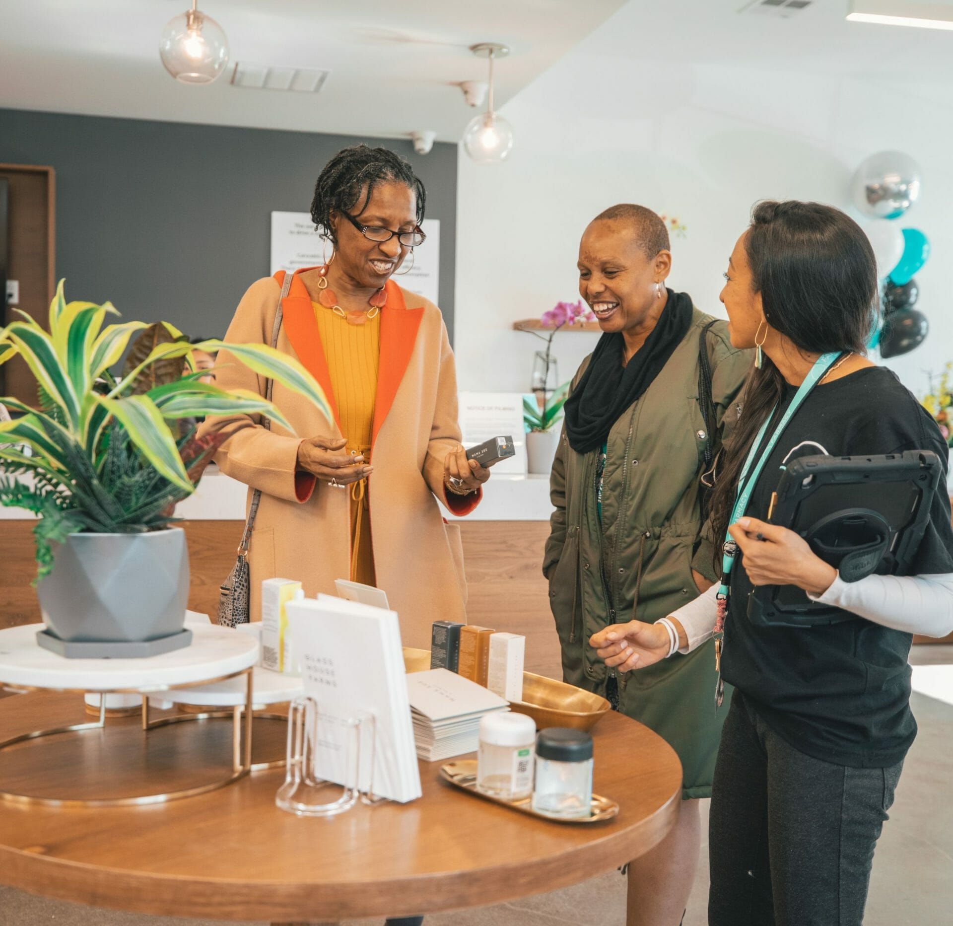 Customers look for cannabis products at Farmacy dispensary in Berkeley with the help of a budtender